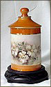 Candy jar decorated with flowers