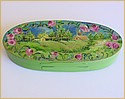 Green jewelry box with flowers